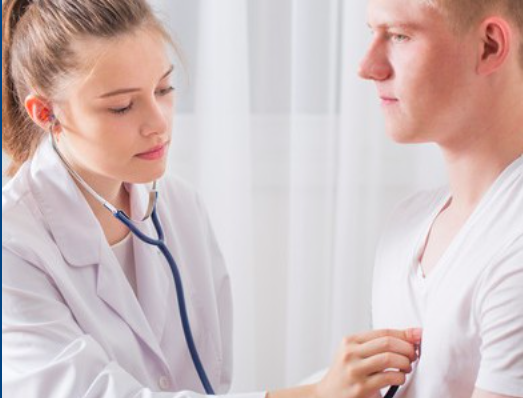Provider listening to patient's heart Provider listening to patient's heart