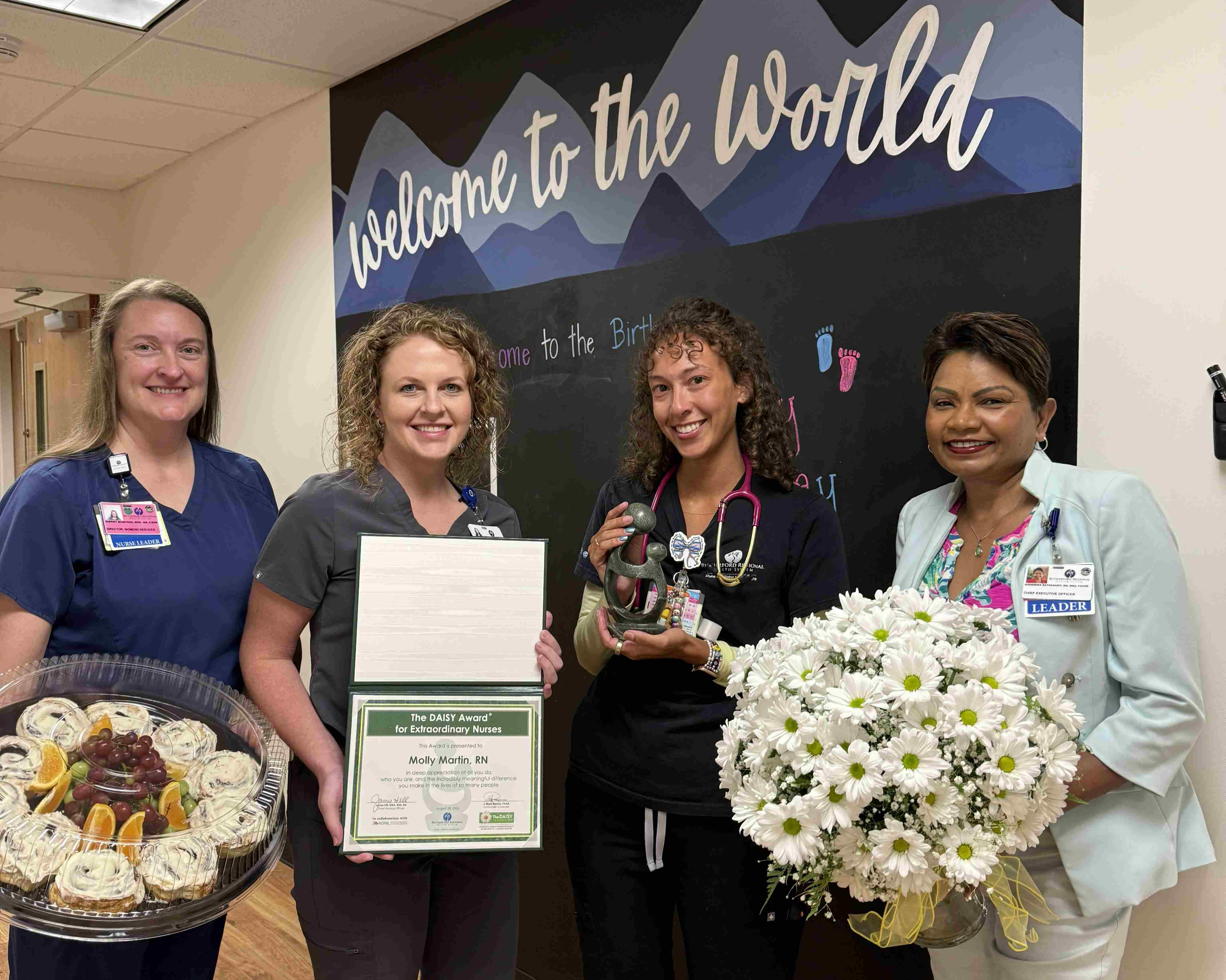 Molly Martin, RN, DAISY Award Winner with RRHS Leadership